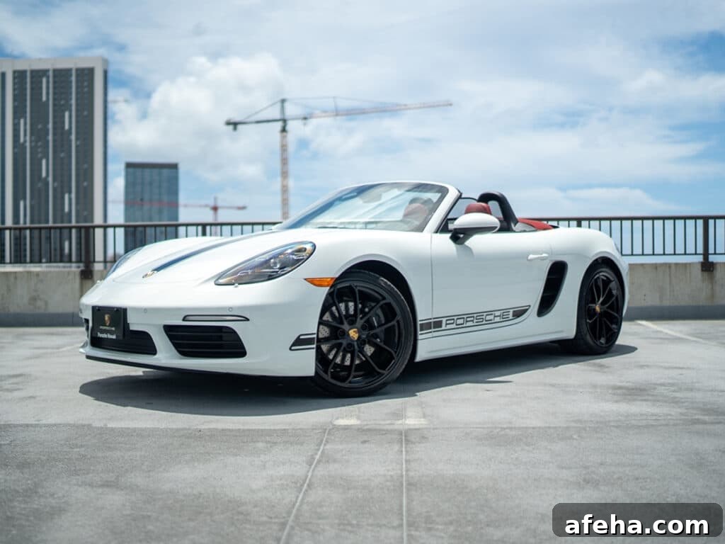 A white Porsche with a Honolulu background.