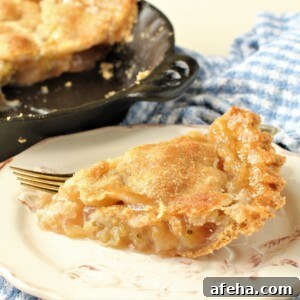 a slice of gooseberry pie on a plate, square image