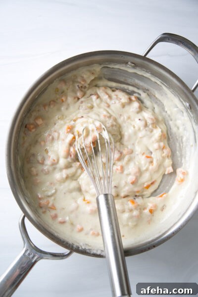 whisking gluten-free bechamel