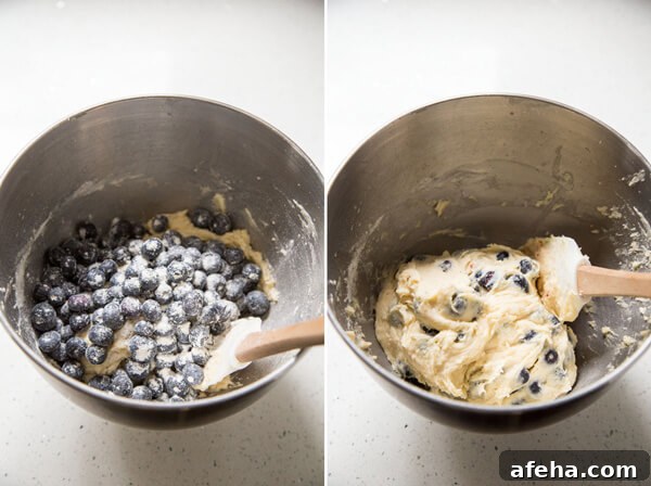 Adding blueberries to the muffin batter