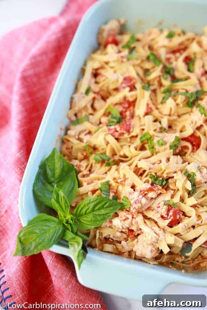 low carb feta pasta in a casserole dish with fresh basil on top and on the side