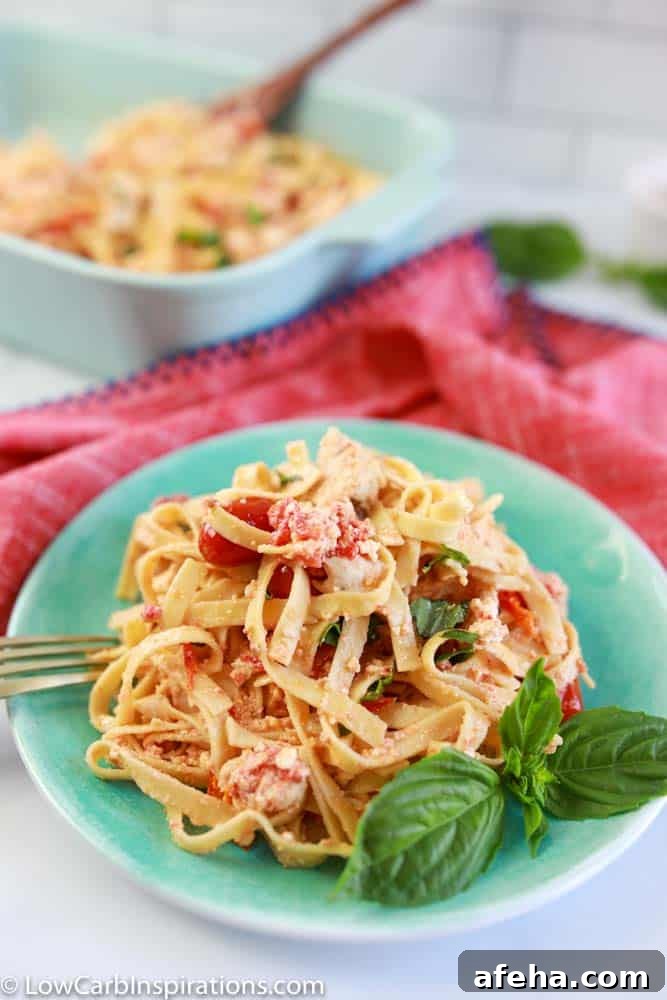 close up photo of baked low carb pasta on a plate with a fork on the side of the plate