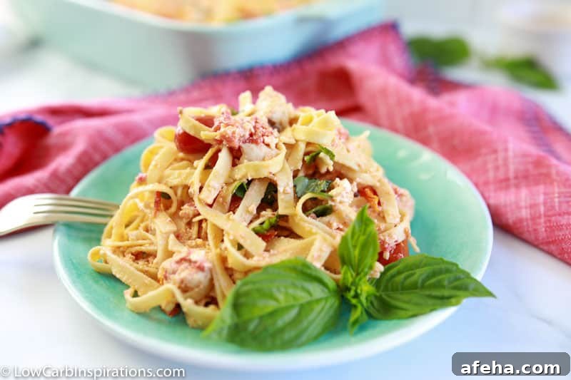close up photo of baked low carb pasta on a plate with a fork on the side of the plate