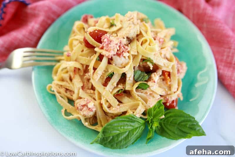 overhead photo of baked low carb pasta on a plate with a fork on the side of the plate