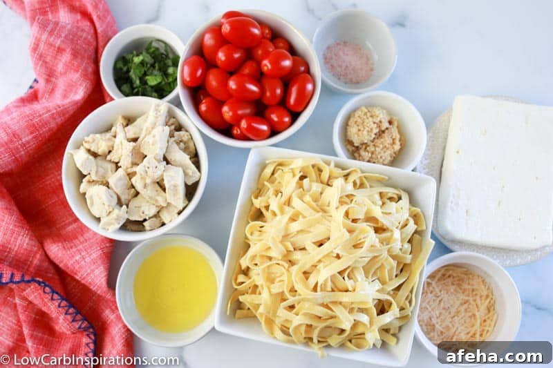 Low Carb Baked Feta Pasta Recipe ingredients in bowls on a table