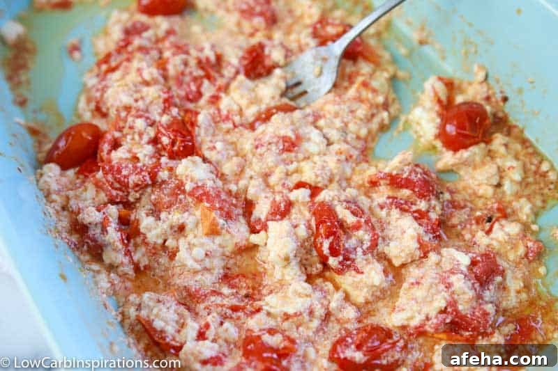 feta cheese, cherry tomatoes, minced garlic and olive oil in a casserole dish mixed together