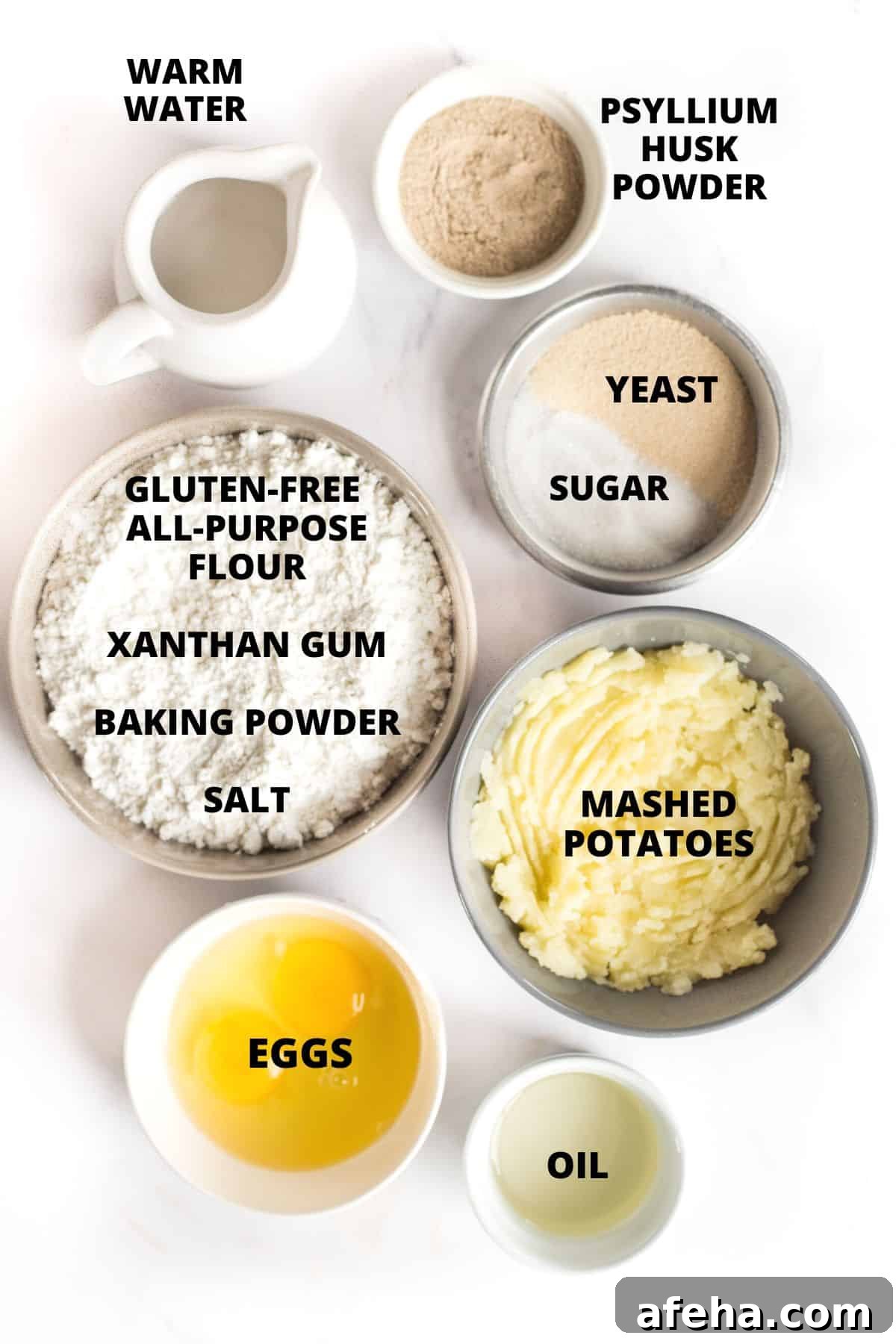 Ingredients required for making gluten-free baguette recipe laid out on marble board.