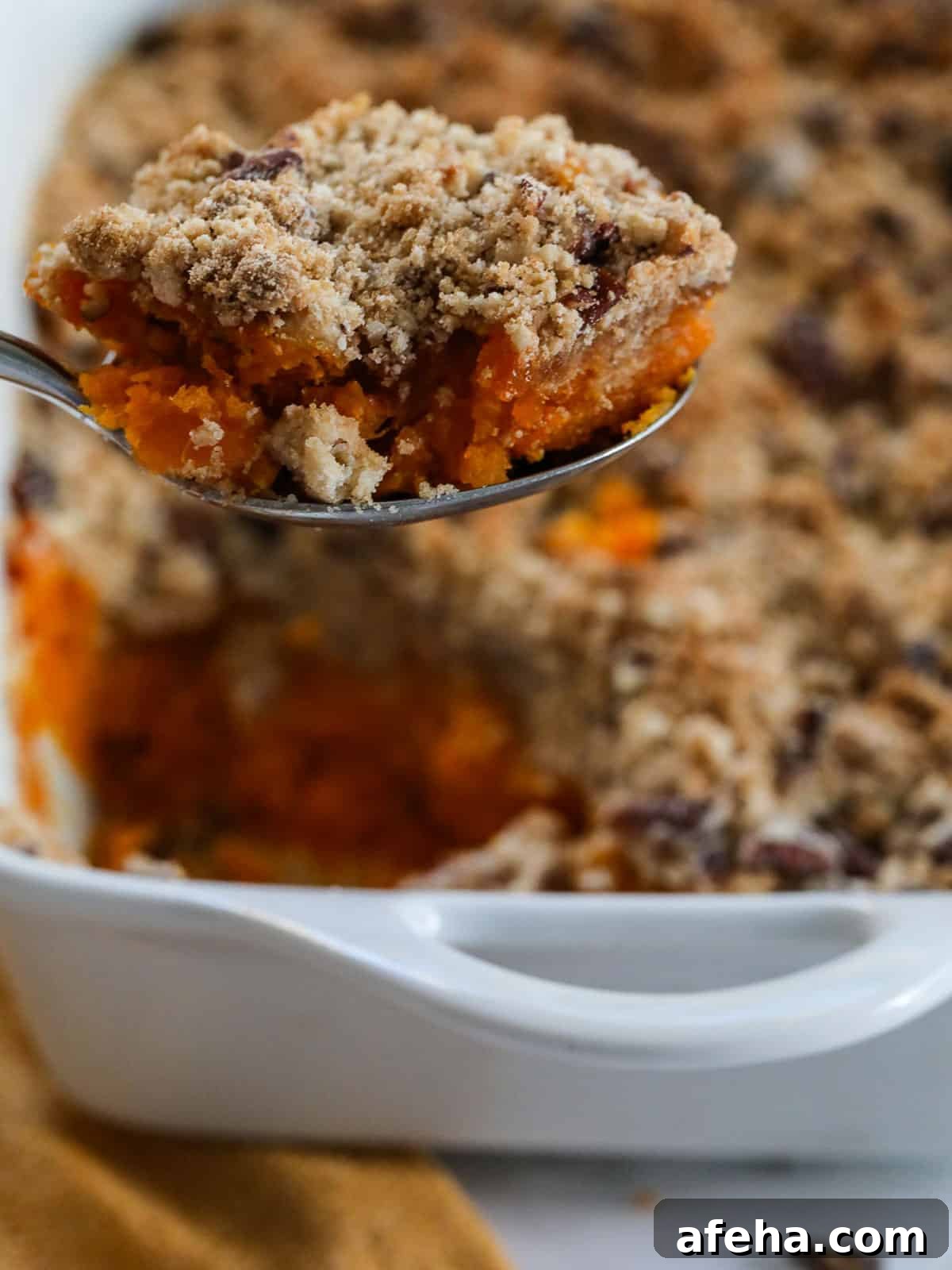 Serving sweet potato casserole at Thanksgiving