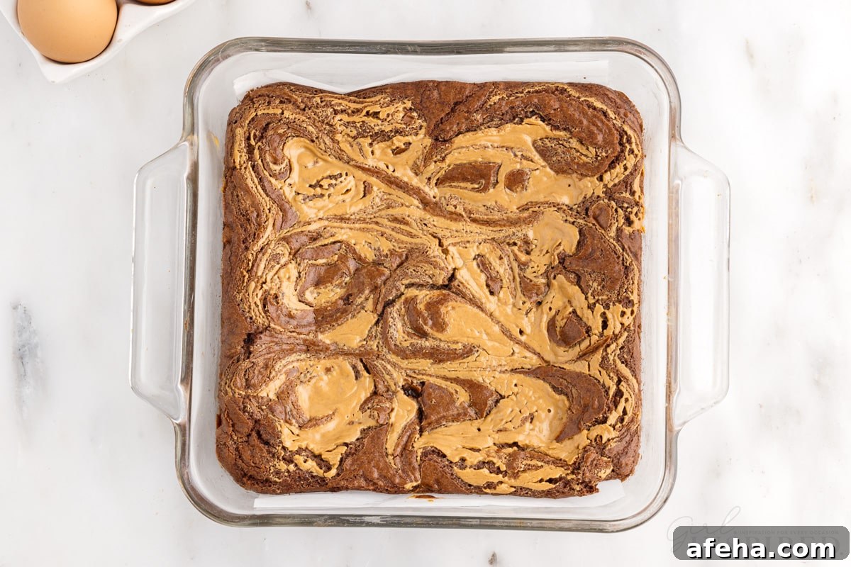 Baked peanut butter brownies recipe in 8x8 pan.