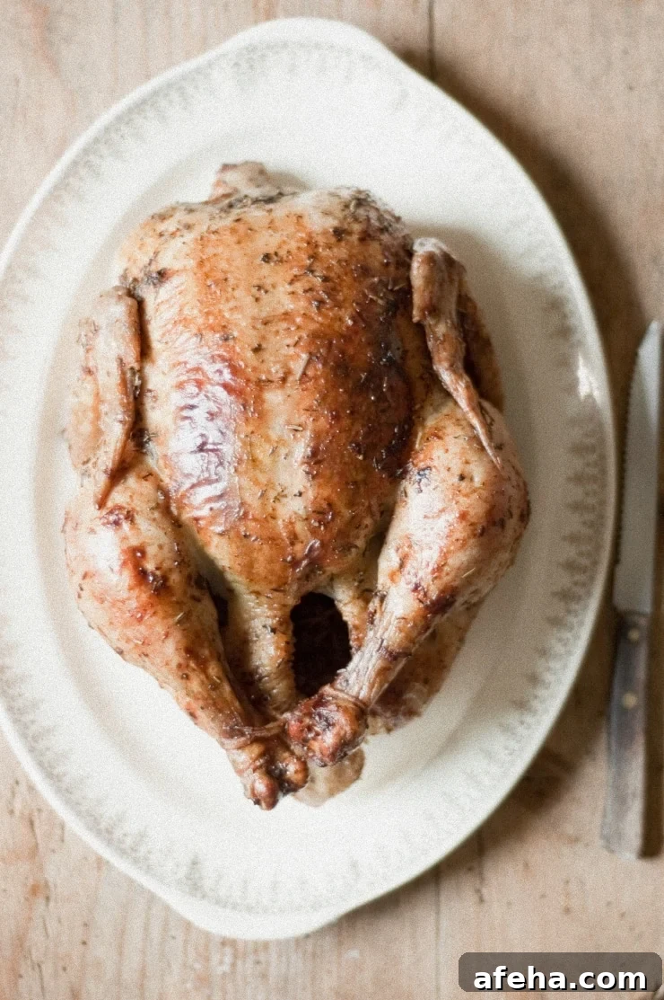 Crispy Lemon-Herb Roasted Chicken Recipe for Juicy Results 4 Lemon and Herb Roasted Chicken Recipe | sophisticatedgourmet.com