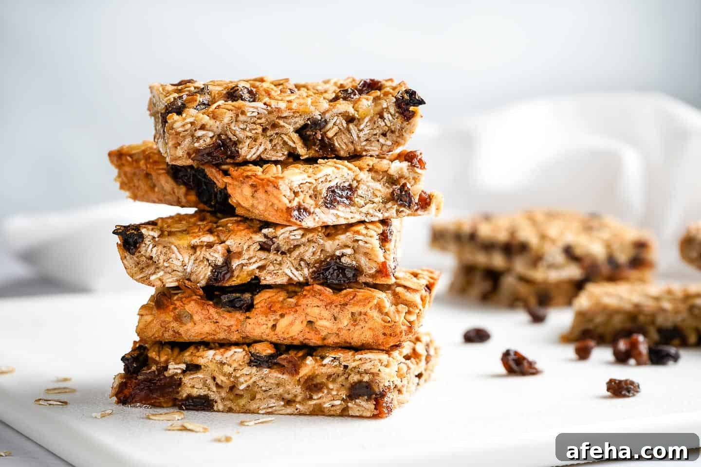 Easy Oatmeal Raisin Breakfast Bars on Cutting board