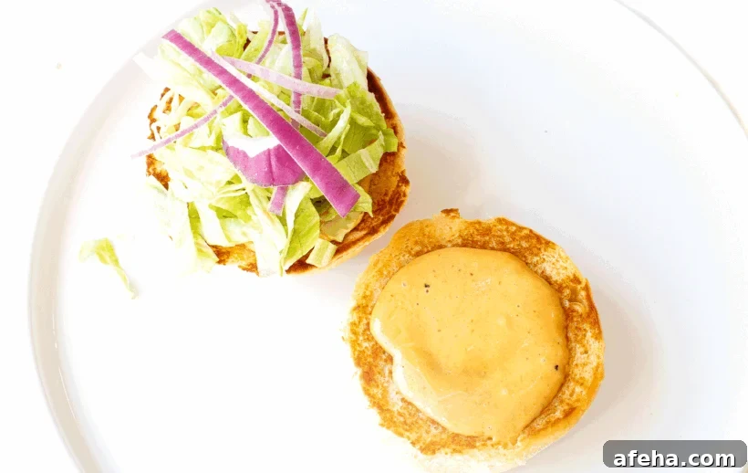 gif of author building burger on homemade burger buns
