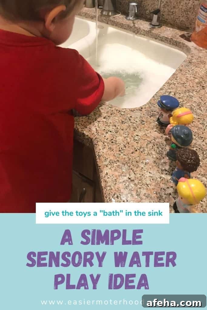 a child engaging in sensory play in the sink, hands are in the water with toys to the side of the sink, and a text description underneath