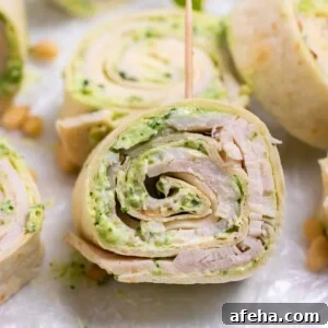 Turkey Pesto pinwheel with toothpick.