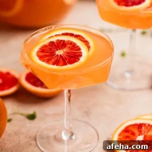 Glass of blood orange champagne sangria.