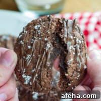 Gluten-Free Nutella Cookies Without Flour — Quick 3-Ingredient Recipe 5 a nutella cookie being split apart.