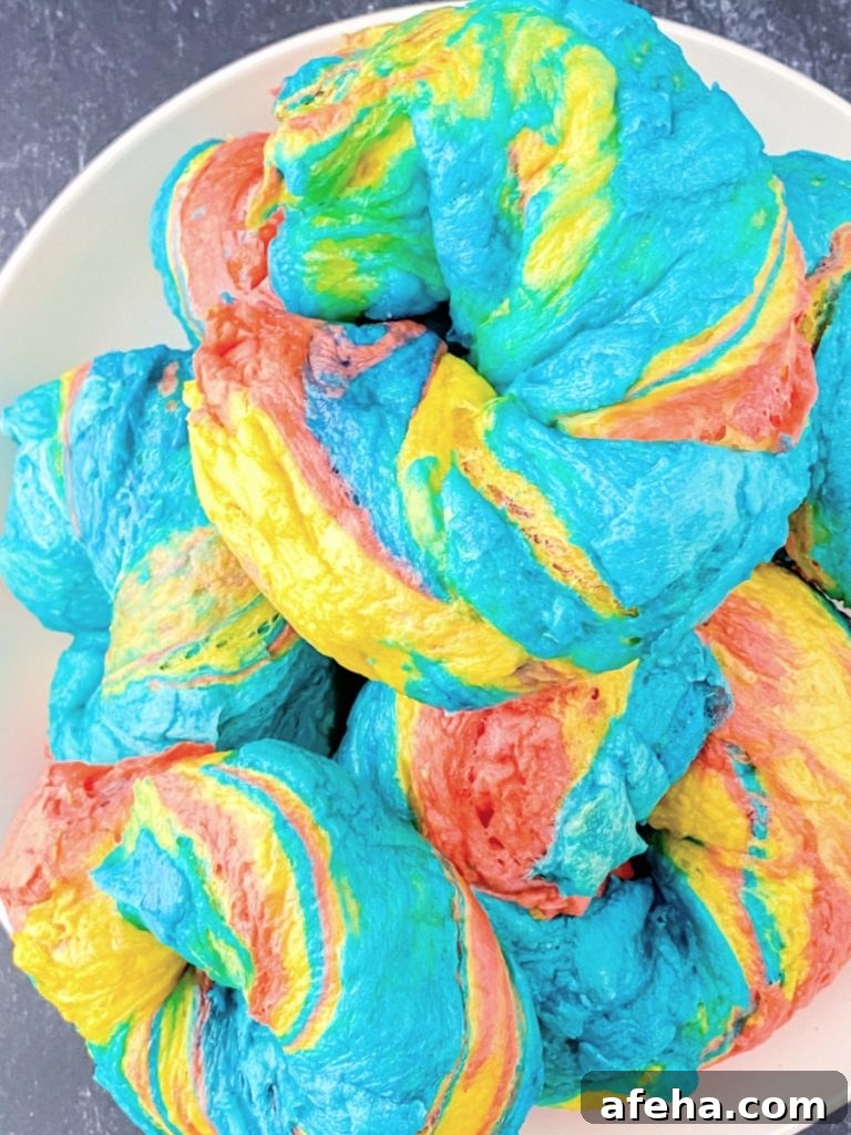 fresh rainbow bagels on a plate