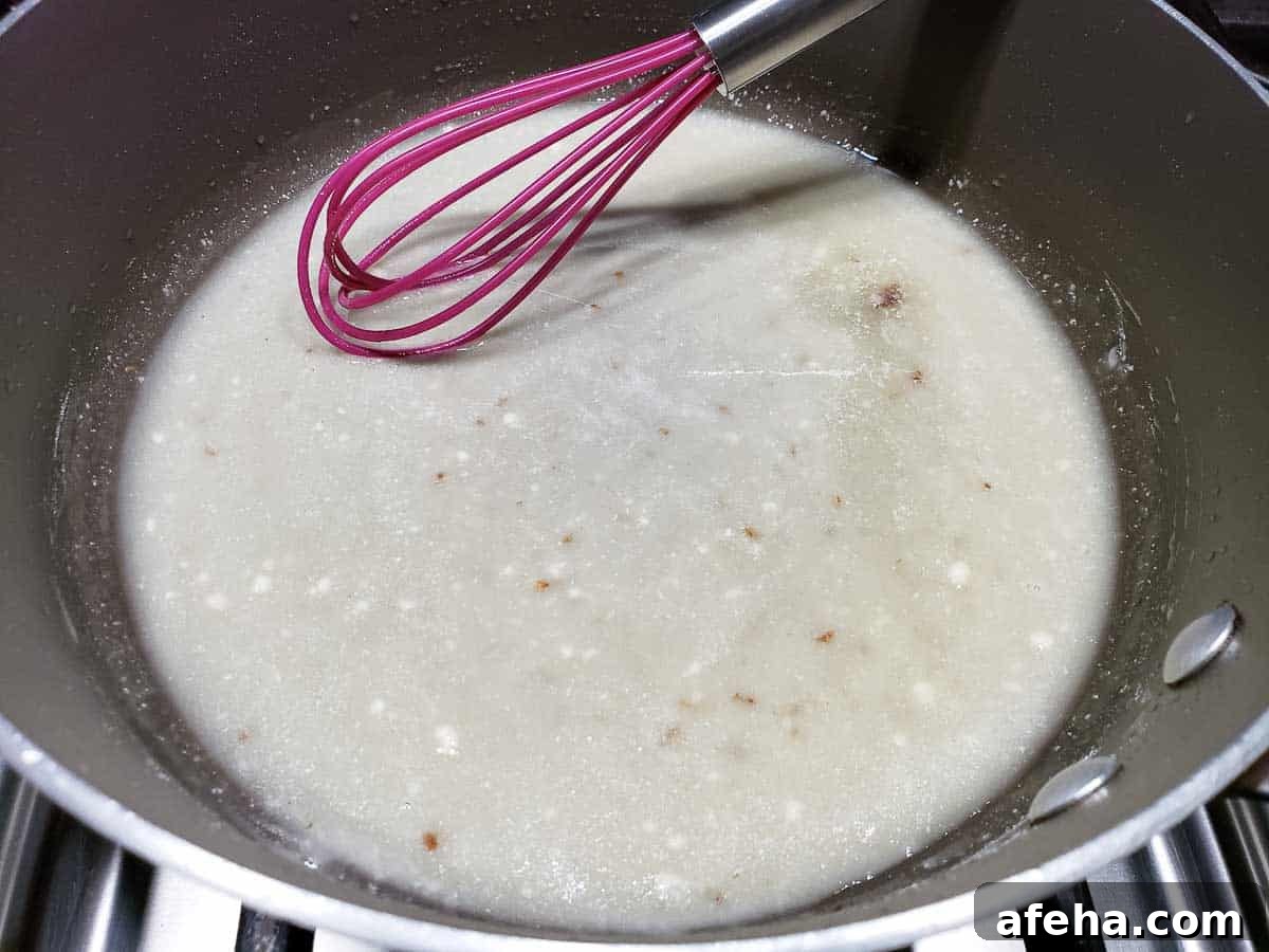 Creamy Cheddar Vegetable Soup Recipe for Cozy Weeknights 7 flour and butter whisked into bacon grease in a pan.
