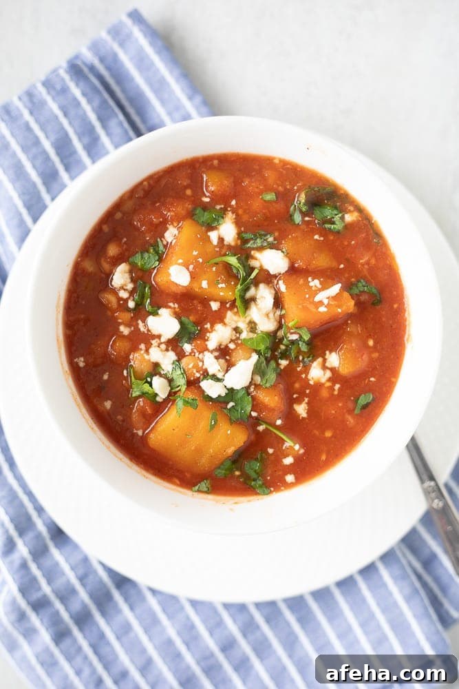 White Bowl filled with chili made with Butternut squash