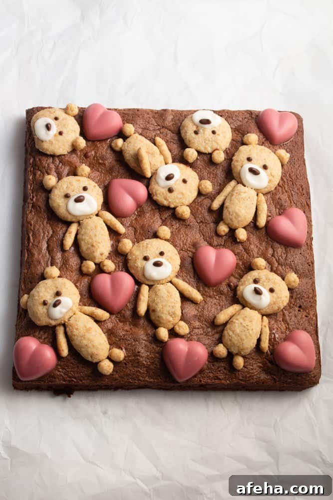 If you’re looking for a cute Valentine’s Day treat, look no further! These teddy bear brownies are cakey brownies topped with cookies and ruby chocolate hearts!