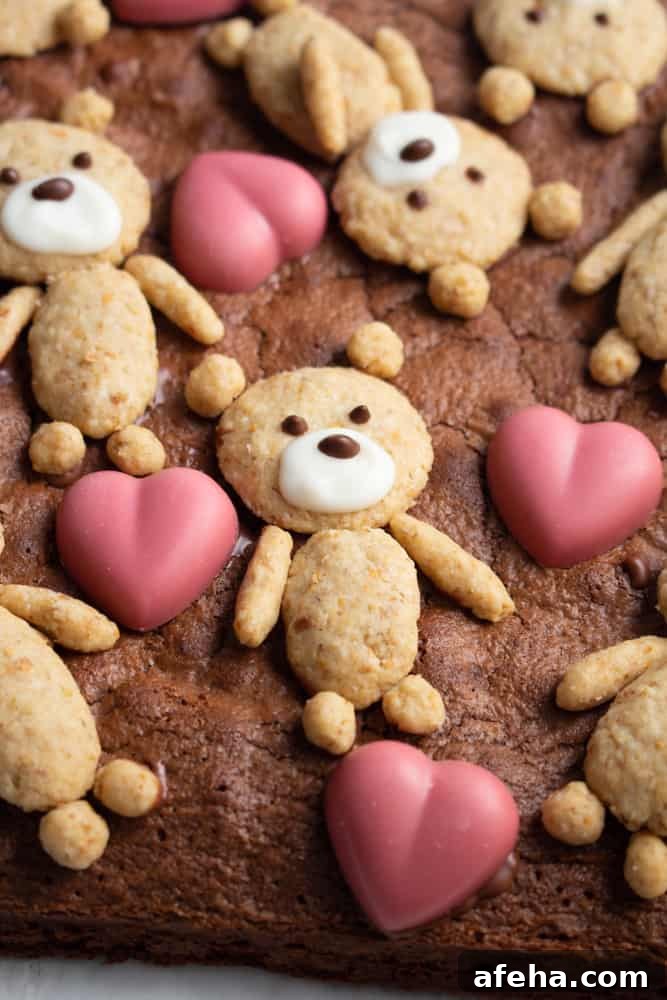 If you’re looking for a cute Valentine’s Day treat, look no further! These teddy bear brownies are cakey brownies topped with cookies and ruby chocolate hearts!