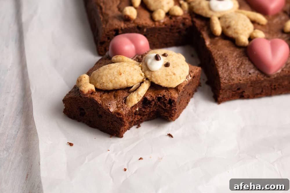 If you’re looking for a cute Valentine’s Day treat, look no further! These teddy bear brownies are cakey brownies topped with cookies and ruby chocolate hearts!