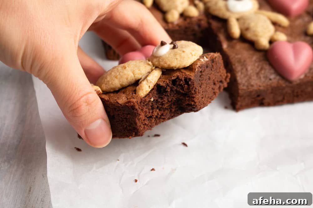 If you’re looking for a cute Valentine’s Day treat, look no further! These teddy bear brownies are cakey brownies topped with cookies and ruby chocolate hearts!