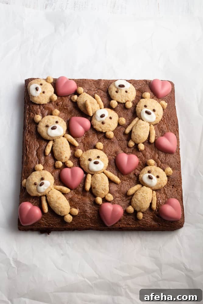 If you’re looking for a cute Valentine’s Day treat, look no further! These teddy bear brownies are cakey brownies topped with cookies and ruby chocolate hearts!
