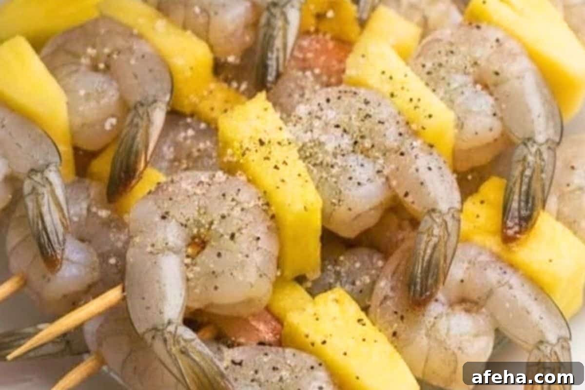 Lightly sprinkle shrimp with salt and cracked pepper 