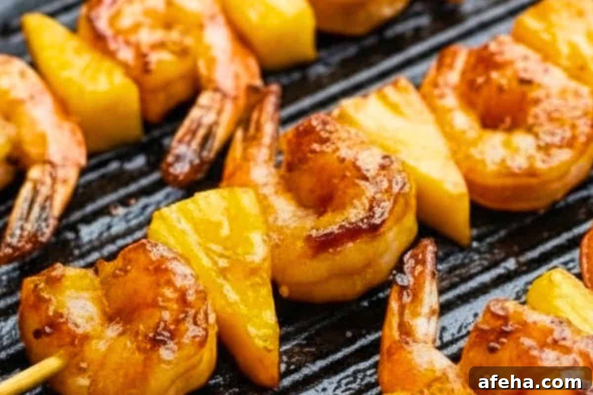 Heat the remaining butter in a large skillet or grill pan over medium heat. Cook skewers in batches for 3–4 minutes per side