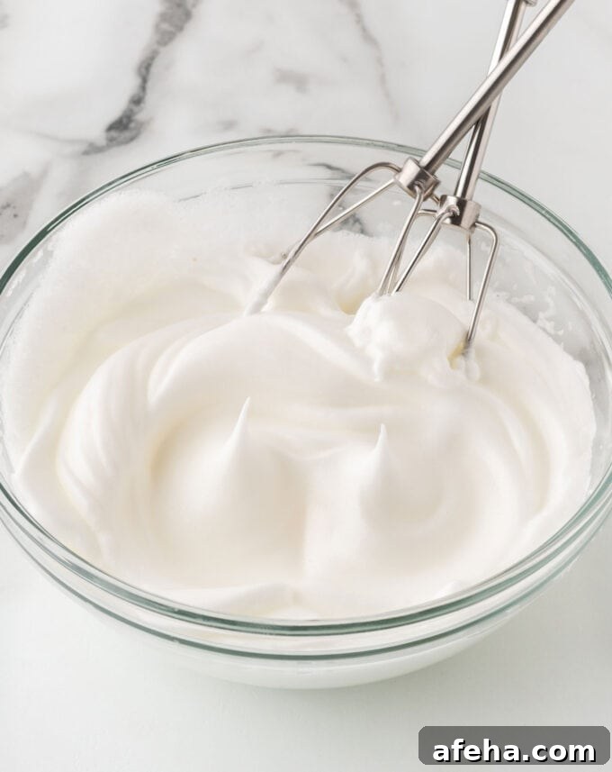 beating egg whites to stiff peaks to make crispy waffles