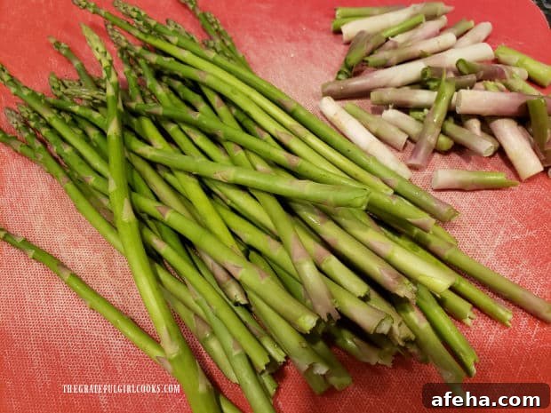 Before cooking, the tough ends of the asparagus stalks are removed.