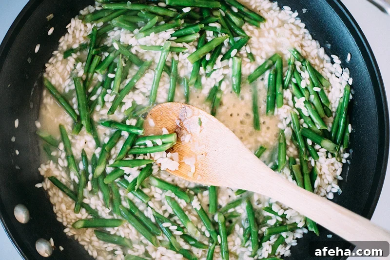 risotto with asparagus in a skillet