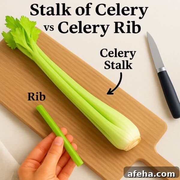 A piece of celery on a cutting board.