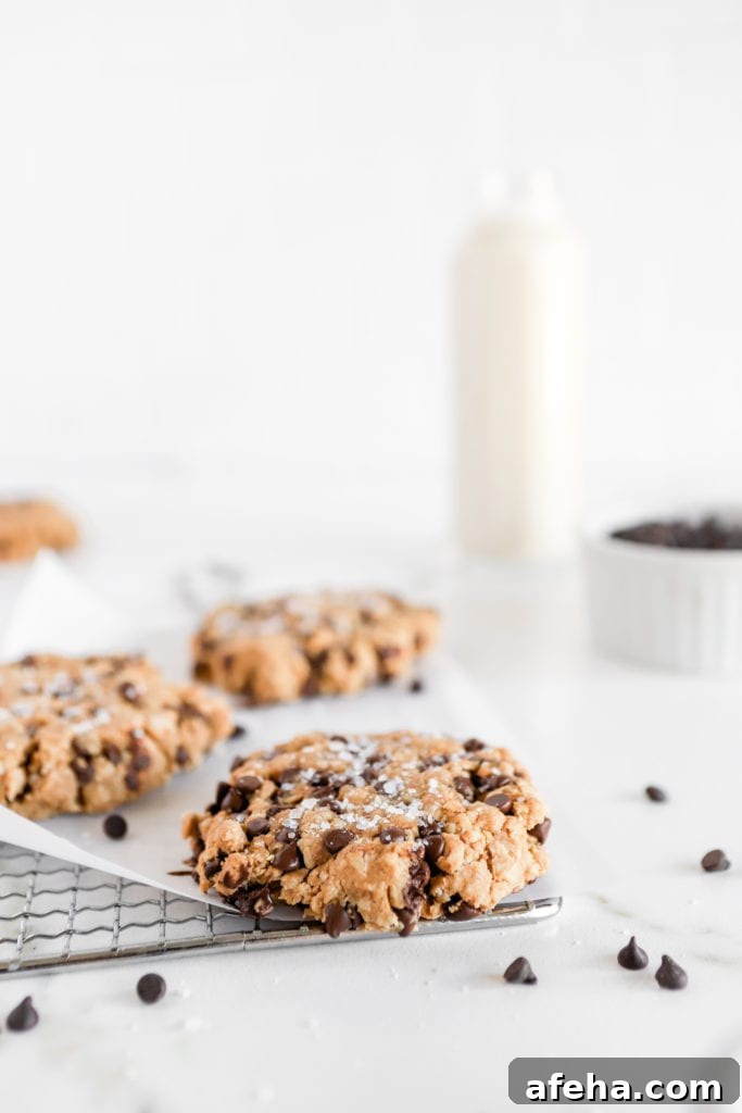 dairy free chewy and soft chocolate chip cookies on a piece of parchment paper