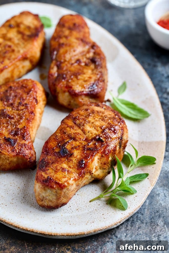 Juicy air fried pork chops on a plate
