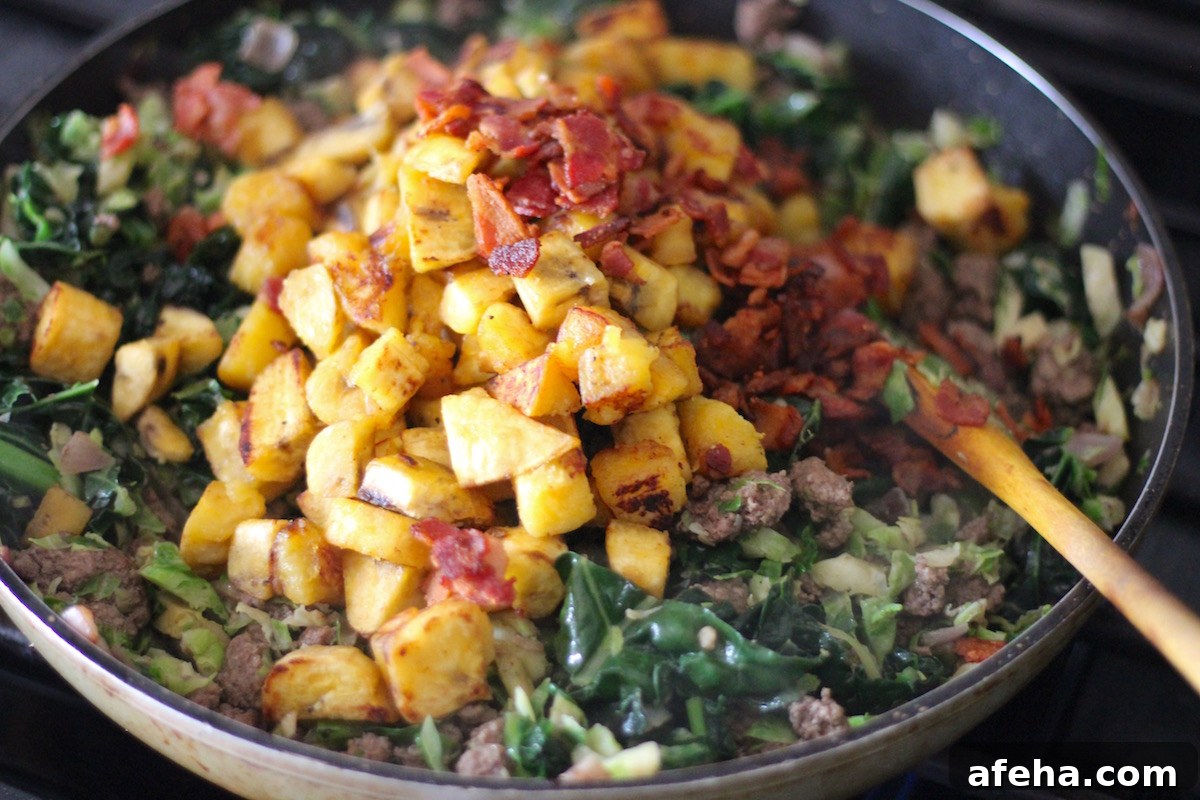 Beef Bacon Plantain Hash (AIP, Paleo) - a hearty hash featuring savory meats, sweet plantains, and colorful veggies! | feddandfulfilled.com