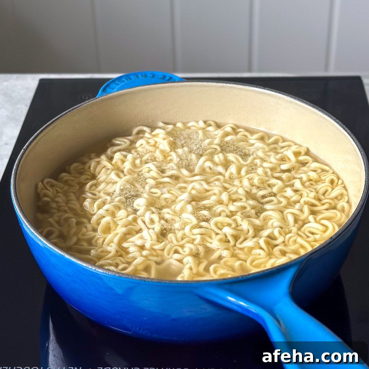 Spicy Buldak Ramen Recipe: Fiery Korean Fire Noodles Tutorial 5 cook the noodles