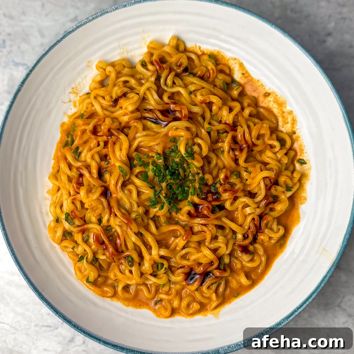 Spicy Buldak Ramen Recipe: Fiery Korean Fire Noodles Tutorial 7 combine noodles and sauce