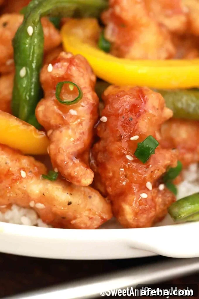 Panda Express honey sesame chicken with green beans and bell pepper.