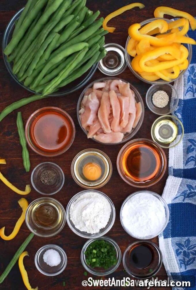 Panda Express honey sesame chicken ingredients in bowls on a wooden table.