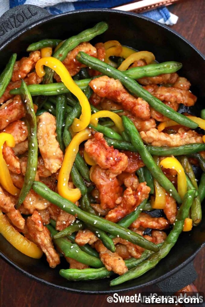 Panda Express honey sesame chicken in a pan.