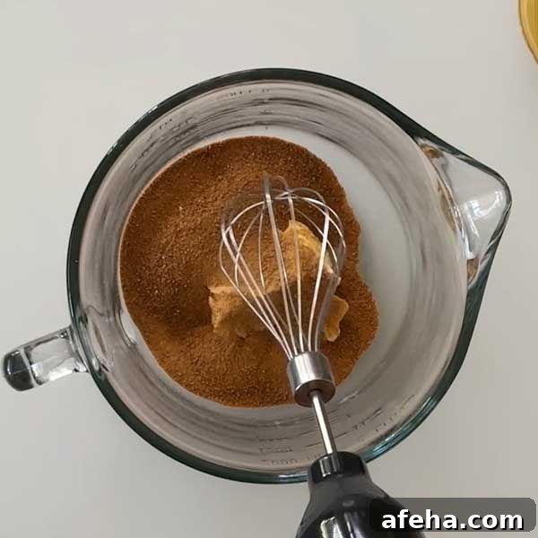 Adding the coconut sugar and butter in a glass mixing bowl.