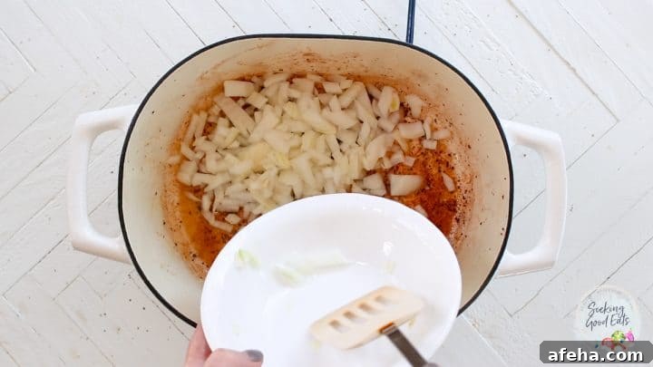 Birria Tacos with Rich Consommé: Where to Eat and How to Make Them 5 Caramalizing the onions in the beef juices and olive oil.