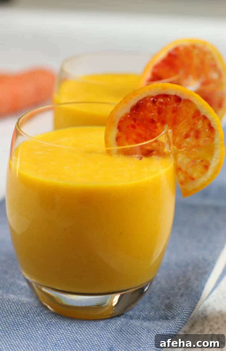 Immune Boosting Citrus Ginger Smoothie - Sweet citrus fruits are blended with carrots, ginger, turmeric, and a bit of coconut oil for healthy fats. Add in additional whole foods vitamin C for an extra boost.