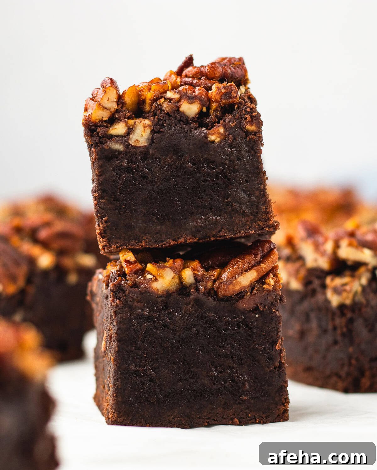 Homemade Pecan Pie Brownies Recipe — From Scratch and Rich 2 two Pecan Pie Brownies stacked on top of each other