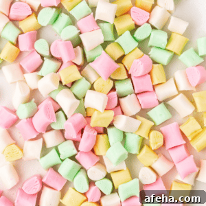 close up of a pile of pink, white, yellow and green butter mints