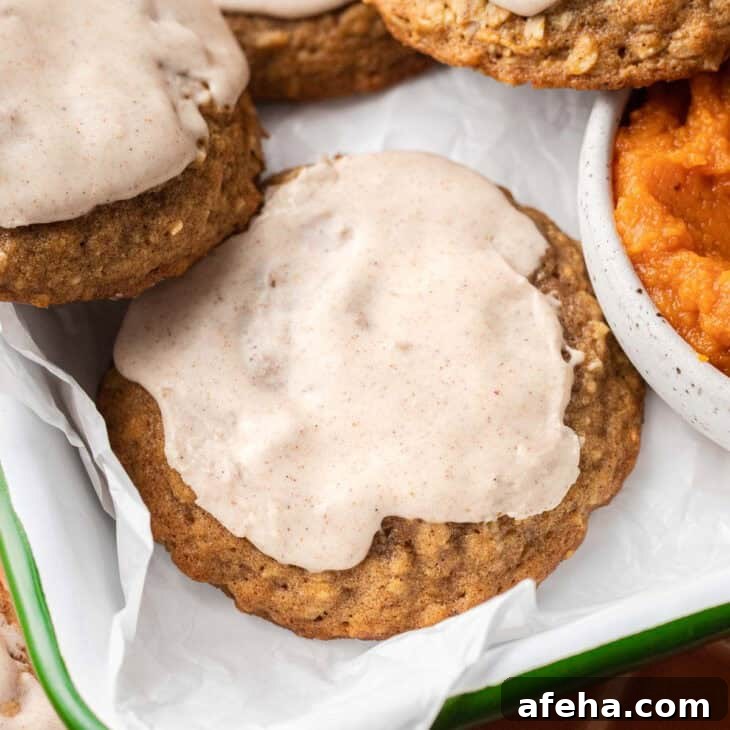 Iced Pumpkin Oatmeal Cookies on tray.