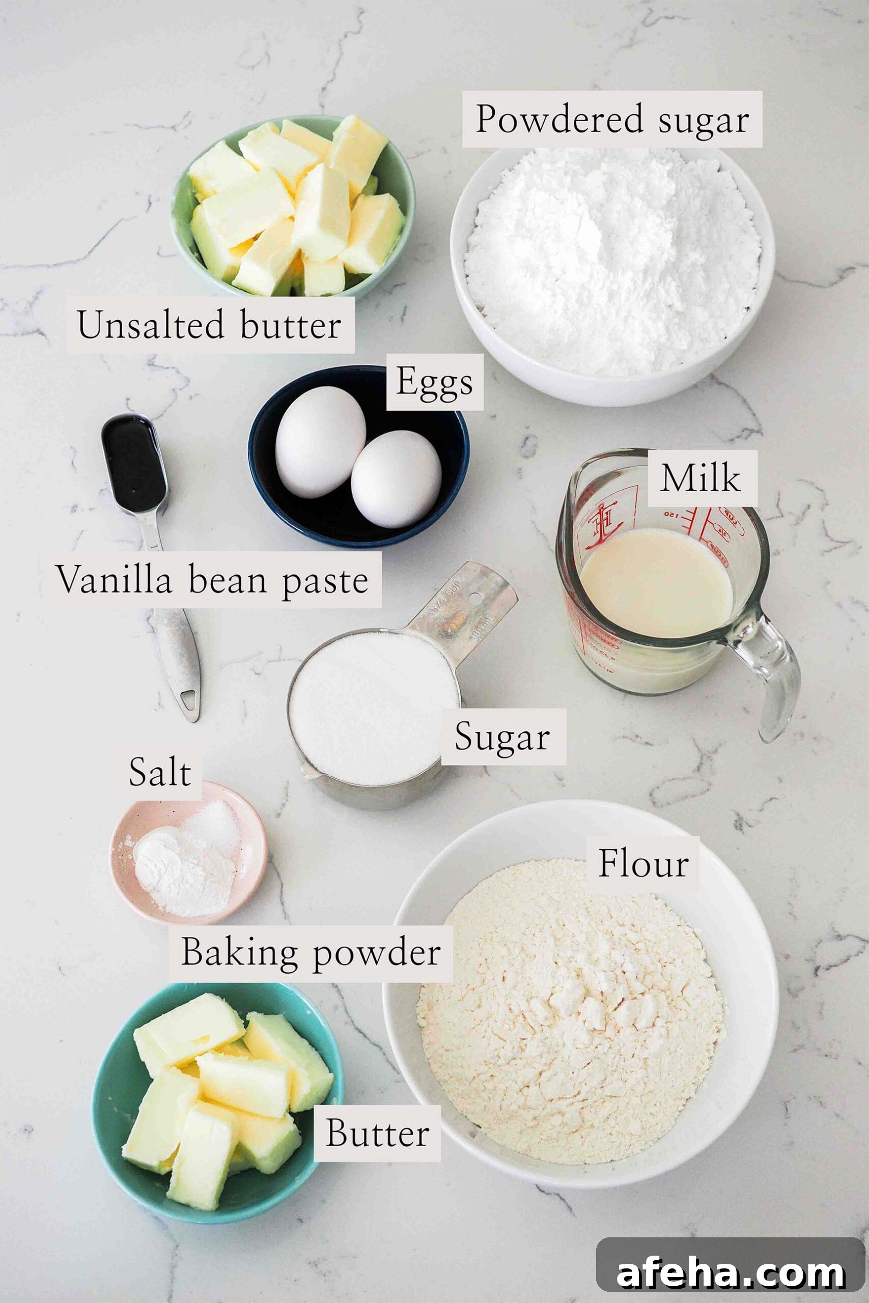 Ingredients for vanilla bean cupcakes on a counter.