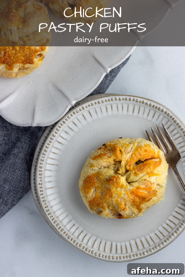 chicken pastry puffs overhead with fork on plates